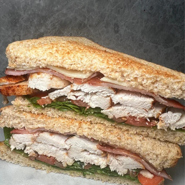 Toasted chicken, bacon and salad sandwich